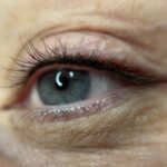 Semi-permanent lash enhancement with a subtle smokey effect for a soft look in Exeter, Devon.
