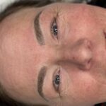 Healed nano brows showing realistic hair-stroke detail and perfect shape